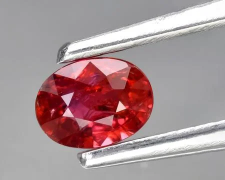 Natural red ruby gem on the background 写真素材