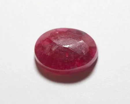 Natural red ruby on the white background Stock Photos