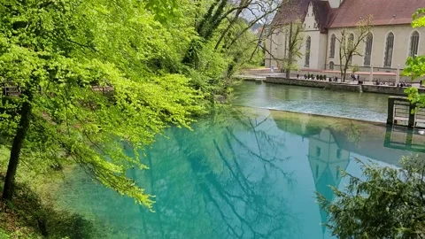 Natural river head called Blautopf in Blaubeuren, Germany, 4K Stock Footage 154825218
