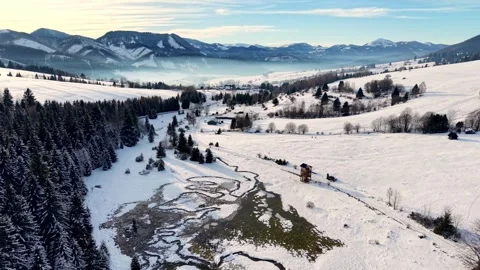 Natural river meanders flowing through winter countryside Stock Footage 333506203