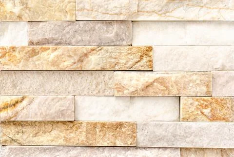 Natural River Stone Cladding Mosaic Tile Wall .Old stone facade, seamless pat Stock Photos