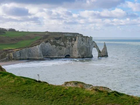 Natural Rock Arch Cliffs Over Sea, Symbol of Love and Valentines Day Romance Stock Photos