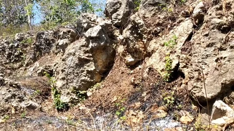 Natural Rock Formation on an Open Slope Stock Footage 341797223