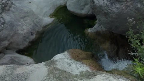 Natural Rock Pool with Water Stream in Rocky Landscape Stock Footage 289667098