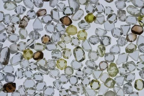 Natural rough diamonds in the sorting process close up Stock Photos