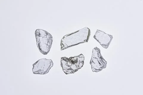 Natural rough diamonds in the sorting process close up Stock Photos