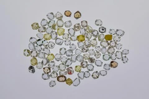 Natural rough diamonds in the sorting process close up Stock Photos