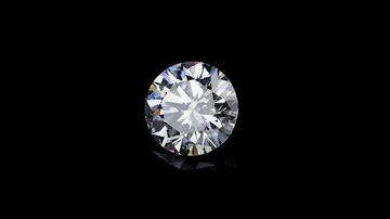 Natural round diamond with real dispersion on a black background (not 3D) Stock Footage
