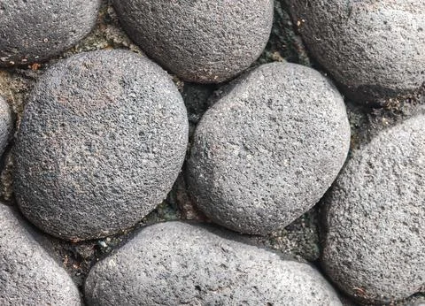 Natural Rounded Stone Surface Texture With Weathered Rock Pattern Stock Photos