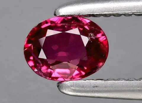 Natural ruby gem on the background 写真素材