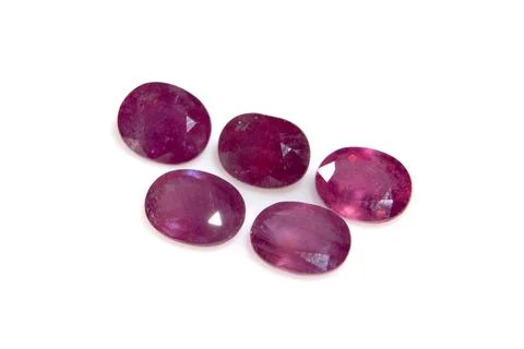 Natural ruby gem stone on the white background Stock Photos