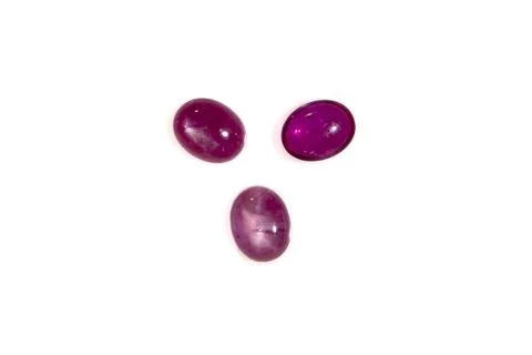 Natural ruby gem stone on the white background Stock Photos