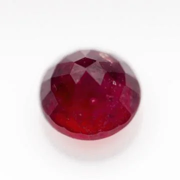 Natural ruby gem on white background Stock Photos