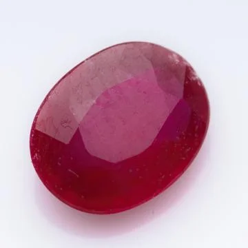 Natural ruby gem on white background Stock Photos