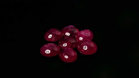 Natural ruby gemstone on the turning table Stock Footage 153017333