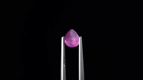 Natural ruby gemstone on the turning table Stock Footage 153019748