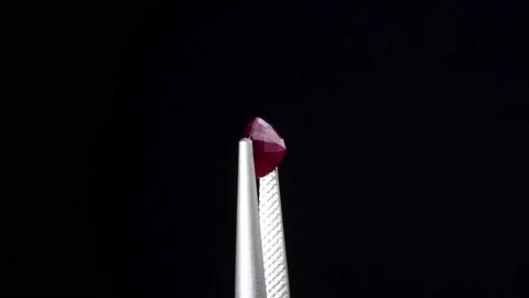 Natural ruby gemstone on the turning table Stock Footage 153019897