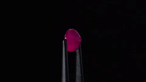 Natural ruby gemstone on the turning table Stock Footage 153020038