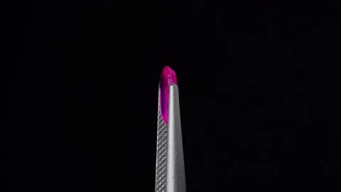 Natural ruby gemstone on the turning table Stock Footage 153020072