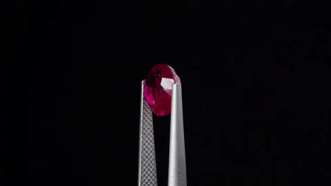 Natural ruby gemstone on the turning table Stock Footage 153020262