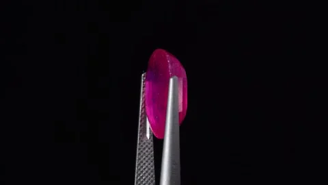 Natural ruby gemstone on the turning table Stock Footage 153020289