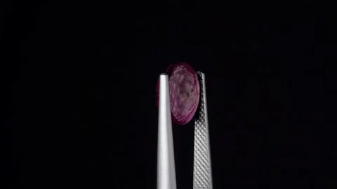 Natural ruby gemstone on the turning table Stock Footage 153020470