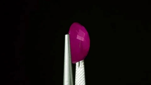 Natural ruby gemstone on the turning table Stock Footage 153020614