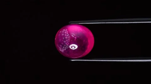 Natural ruby gemstone on the turning table Stock Footage 153020746