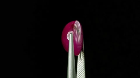 Natural ruby gemstone on the turning table Stock Footage 153020890