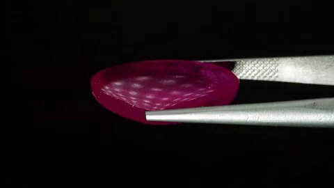 Natural ruby gemstone on the turning table Stock Footage 153021005