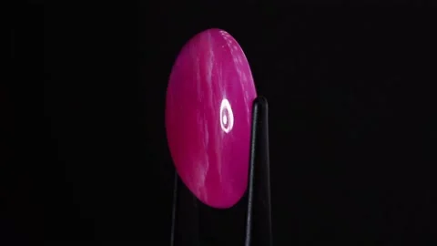 Natural ruby gemstone on the turning table Stock Footage 153021066