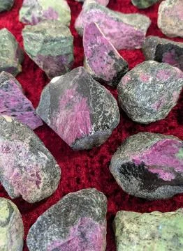 Natural Ruby Zoisite Crystals on Red Velvet Stock Photos