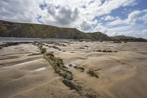 Natural sand patterns at low tide on Sandymouth Bay Fotos Stock
