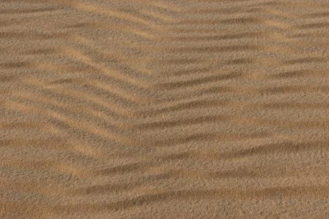 Natural sand ripples texture background on a desert dune at Khor Al Adaid  Stockfoto's