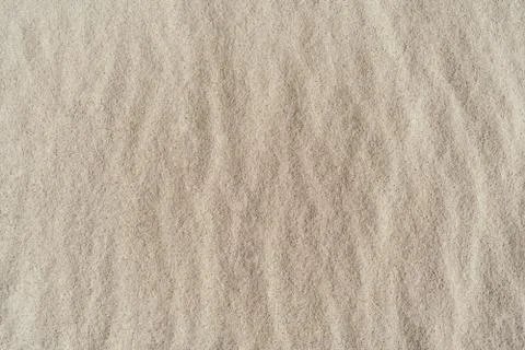Natural sand texture background close up. Stock Photos