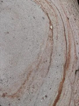 Natural Sandstone Rock Surface with Terracotta Mineral Swirl Patterns Stock Photos