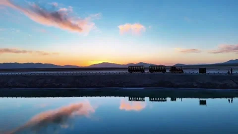 Natural Scenery of Sightseeing Bus Driving by Lake in Qinghai, China Stock Footage 336702154