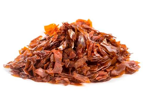 Natural shellac in flakes, which is used as food glaze and wood finish Foto stock