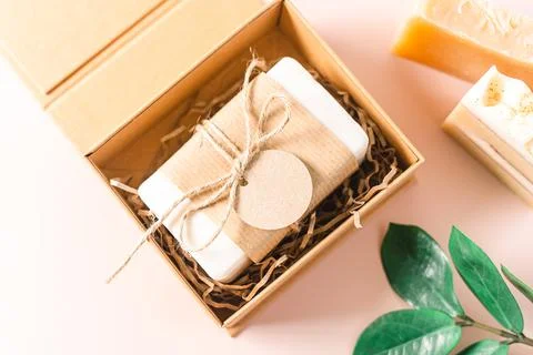 Natural soap in gift box with empty mockup tag Stock Photos