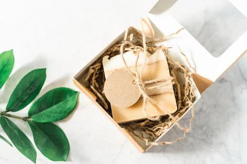 Natural soap in gift box with empty mockup tag Stock Photos