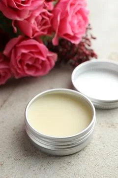 Natural solid perfume and flowers on light table, closeup 스톡 사진