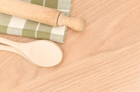 Natural solid wood kitchen tools and table napkin on a wooden tabletop 스톡 사진