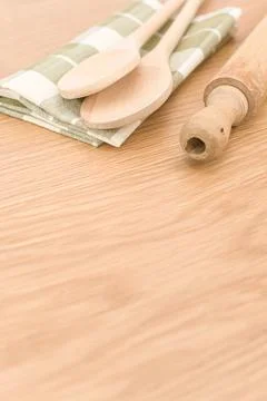 Natural solid wood kitchen tools and table napkin on a wooden tabletop 스톡 사진