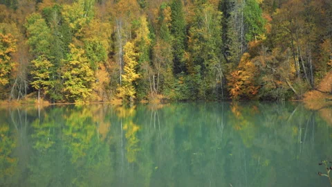 The natural source of the Red Key in Bashkiria is blue. At sunset in autumn Stock Footage 132792456