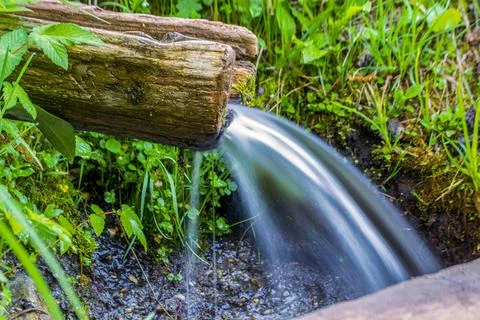 Natural spring, source of clean water. quality photo Stock Photos