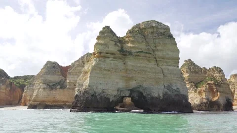Natural stone arc cliff formation in Portugal Stock Footage 273674527
