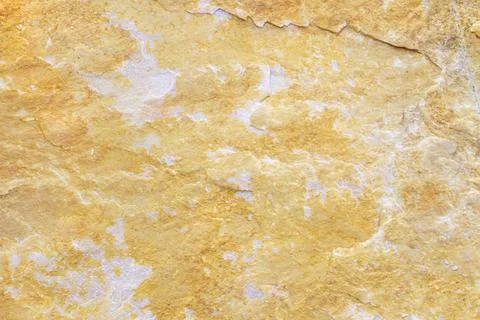 Natural stone background texture with beige, yellow and gray tones Stock Photos