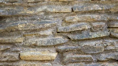 Natural stone facade, stone texture yellow natural stone facade, wall tiles t Stock Photos