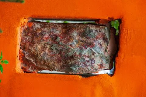 A natural stone of a rectangular shape in the form of a brick inserted into t Stock Photos