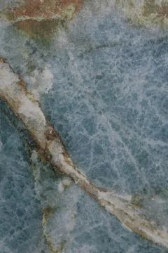 Natural stone surface featuring a stunning blue and white marble pattern with 스톡 사진